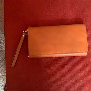 Very nice genuine leather clutch with magnetic closures